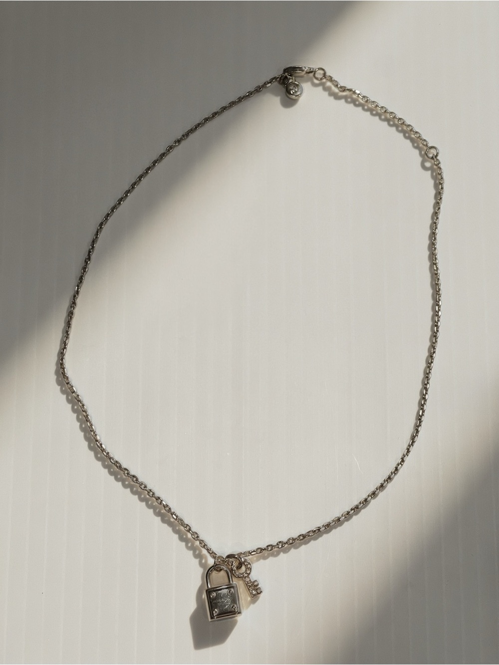 Michael Kors Silver Padlock Pendant Necklace with Crystal Tab